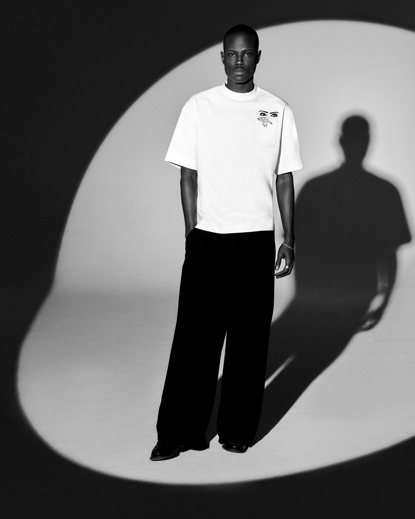 PEEPING TEE