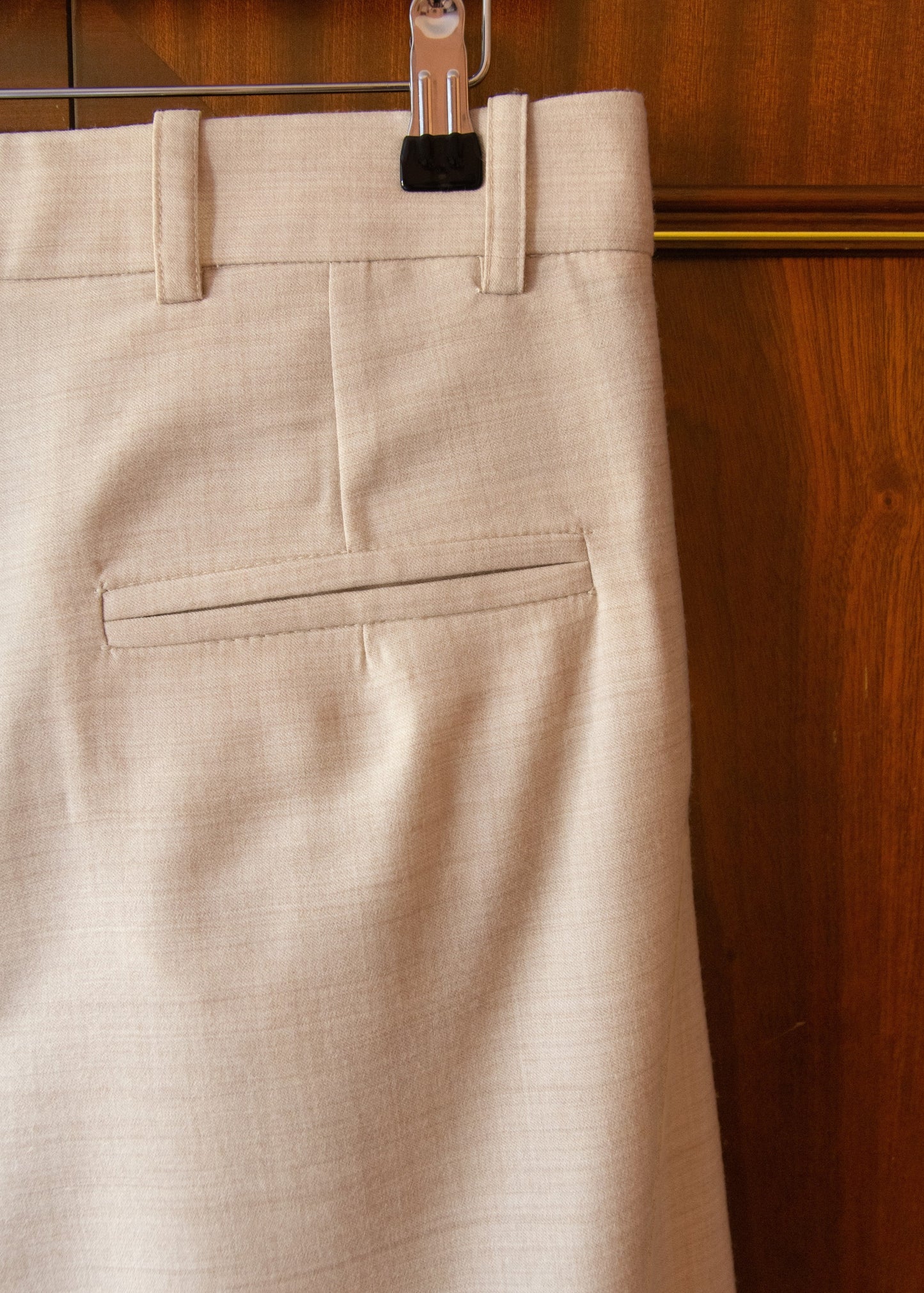 PLEATED WOOL FLOCK TROUSERS IN CREAM