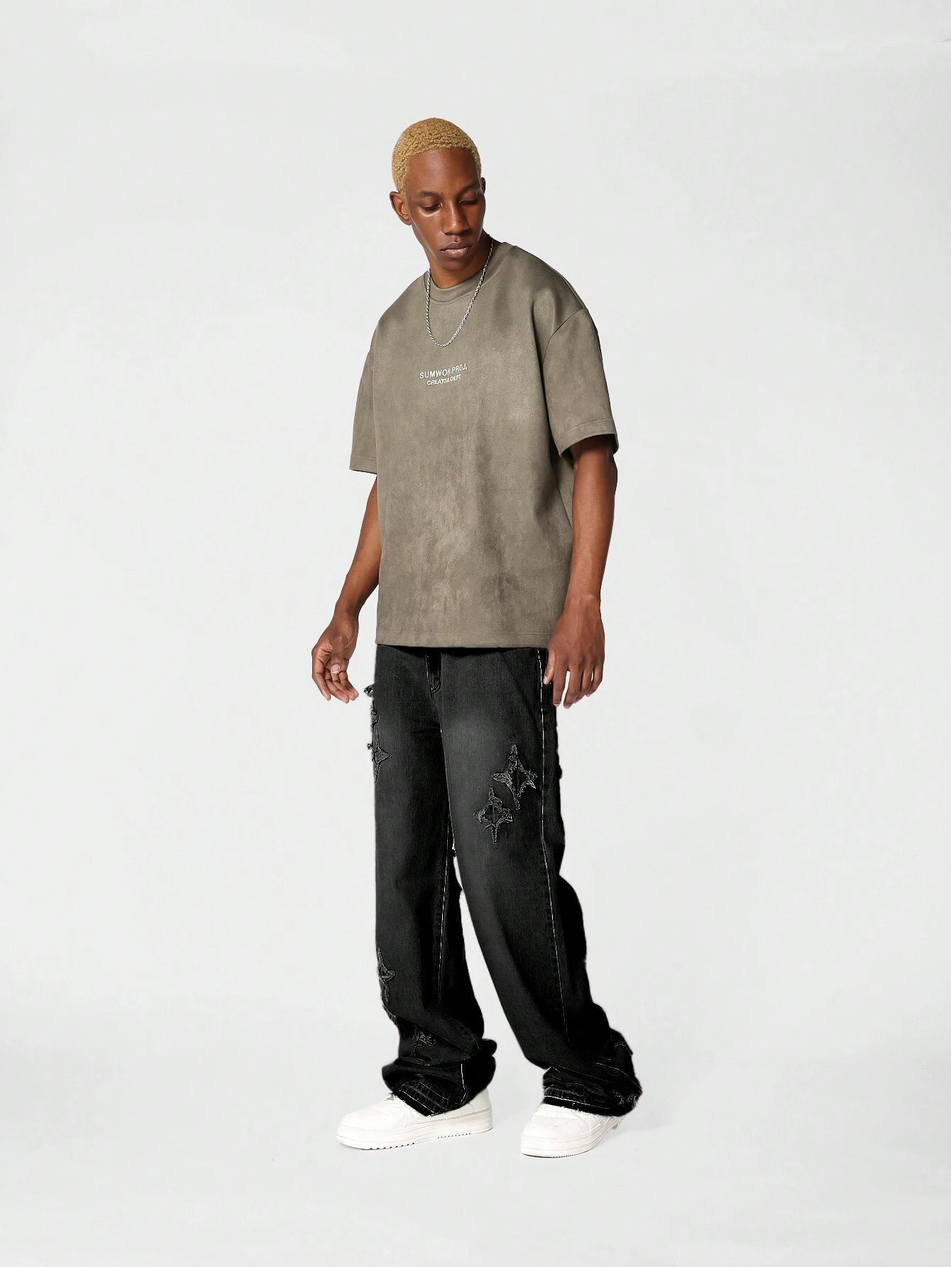 Calça Denim Solto com Aplicação Stars