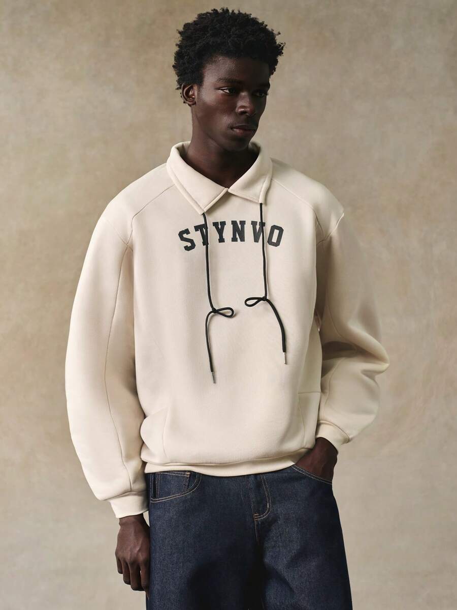 STYNVO Moletom Casual Masculino com Estampa de Letra Solta de Ombro Caído, Moletom Gráfico Cropped de Outono para Rua, Moletom Gráfico Streetwear