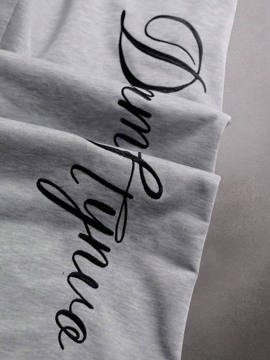 STYNVO Calça Masculina com Estampa de Letra, Cintura com Cordão e Bolso, Perna Larga