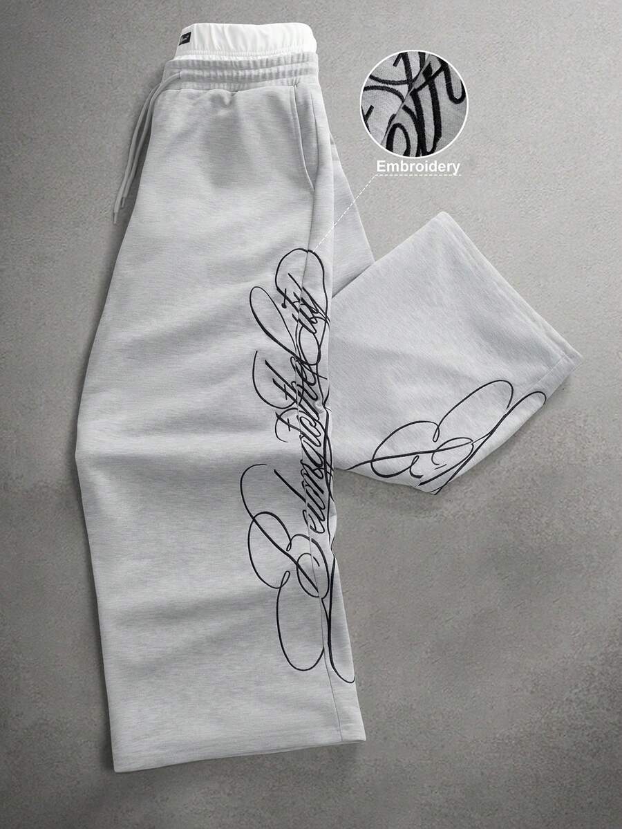 STYNVO Calça Masculina com Estampa de Letra, Cintura com Cordão e Bolso, Perna Larga