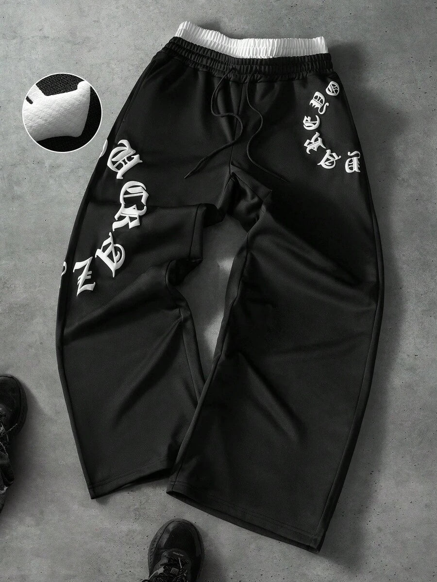 STYNVO Calça Masculina com Estampa de Letra, Cintura com Cordão e Bolso, Perna Larga