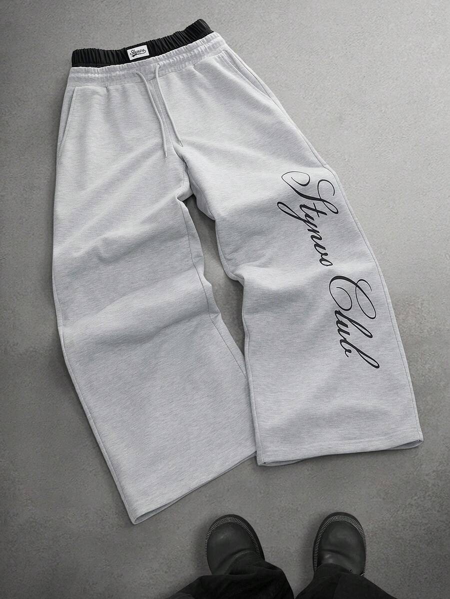STYNVO Calça Masculina com Estampa de Letra, Cintura com Cordão e Bolso, Perna Larga