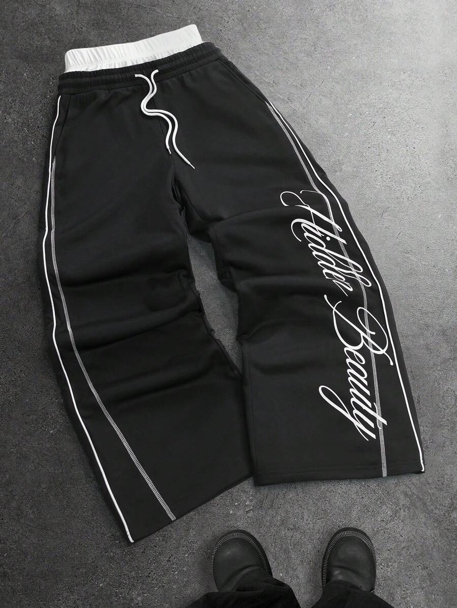 STYNVO Calça Masculina com Estampa de Letra, Cintura com Cordão e Bolso, Perna Larga