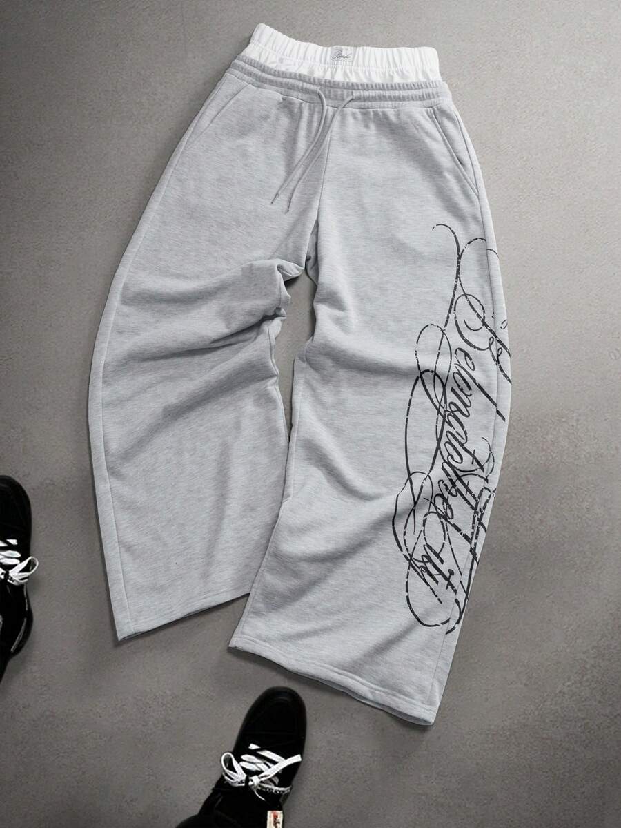 STYNVO Calça Masculina com Estampa de Letra, Cintura com Cordão e Bolso, Perna Larga