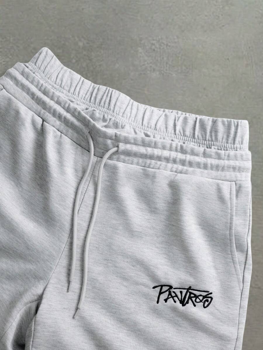 STYNVO Calça Masculina com Estampa de Letra, Cintura com Cordão e Bolso, Perna Larga