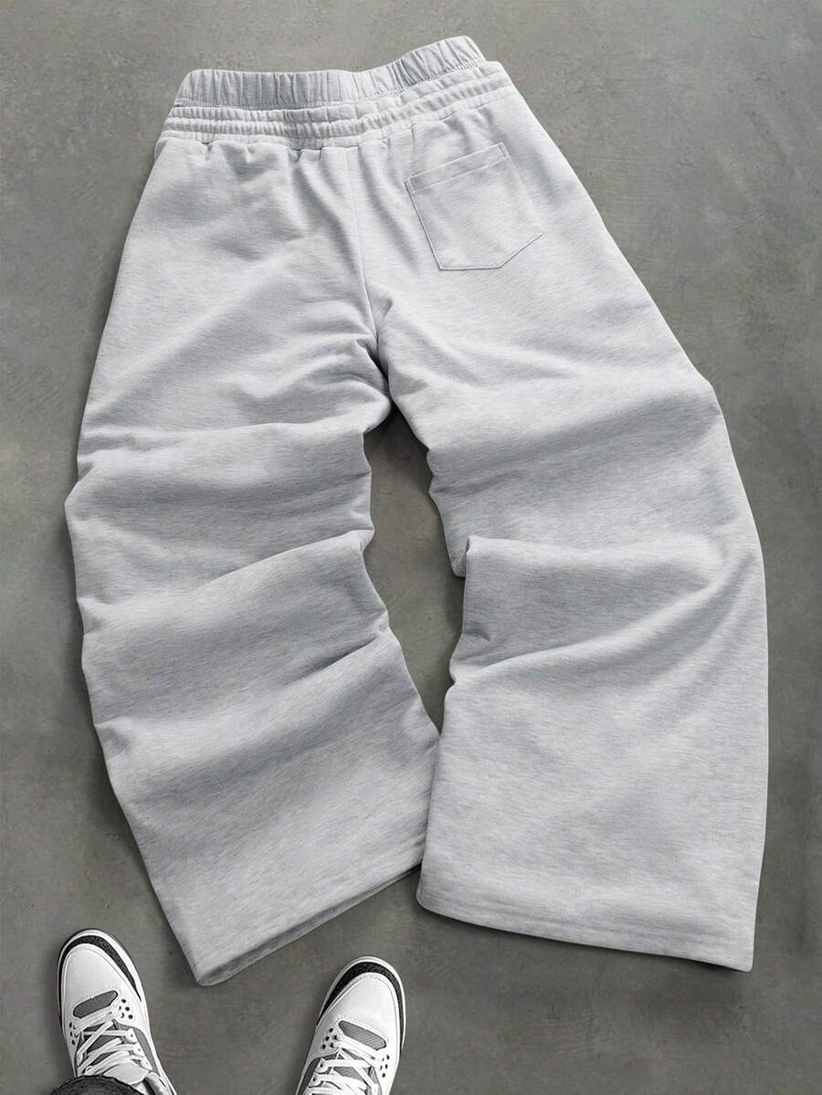 STYNVO Calça Masculina com Estampa de Letra, Cintura com Cordão e Bolso, Perna Larga