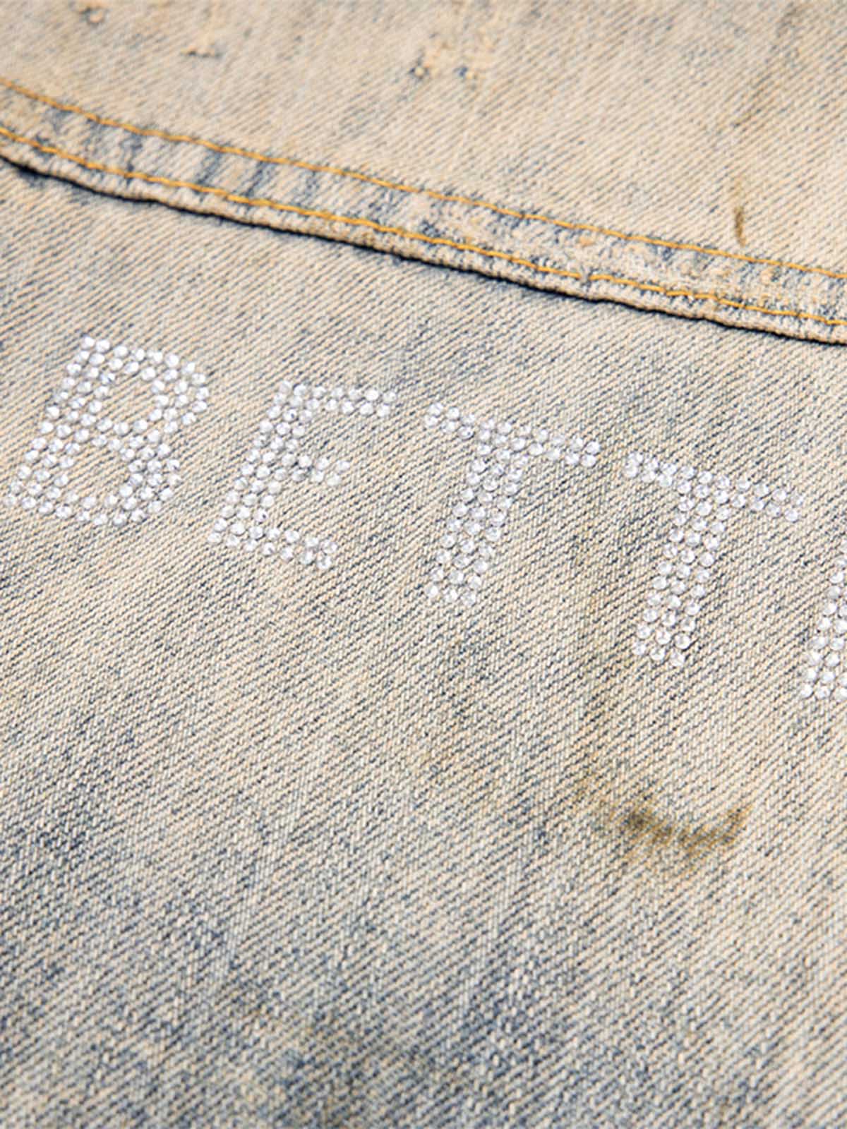 JAQUETA DISTRESSED RHINESTONE MUD-DYED