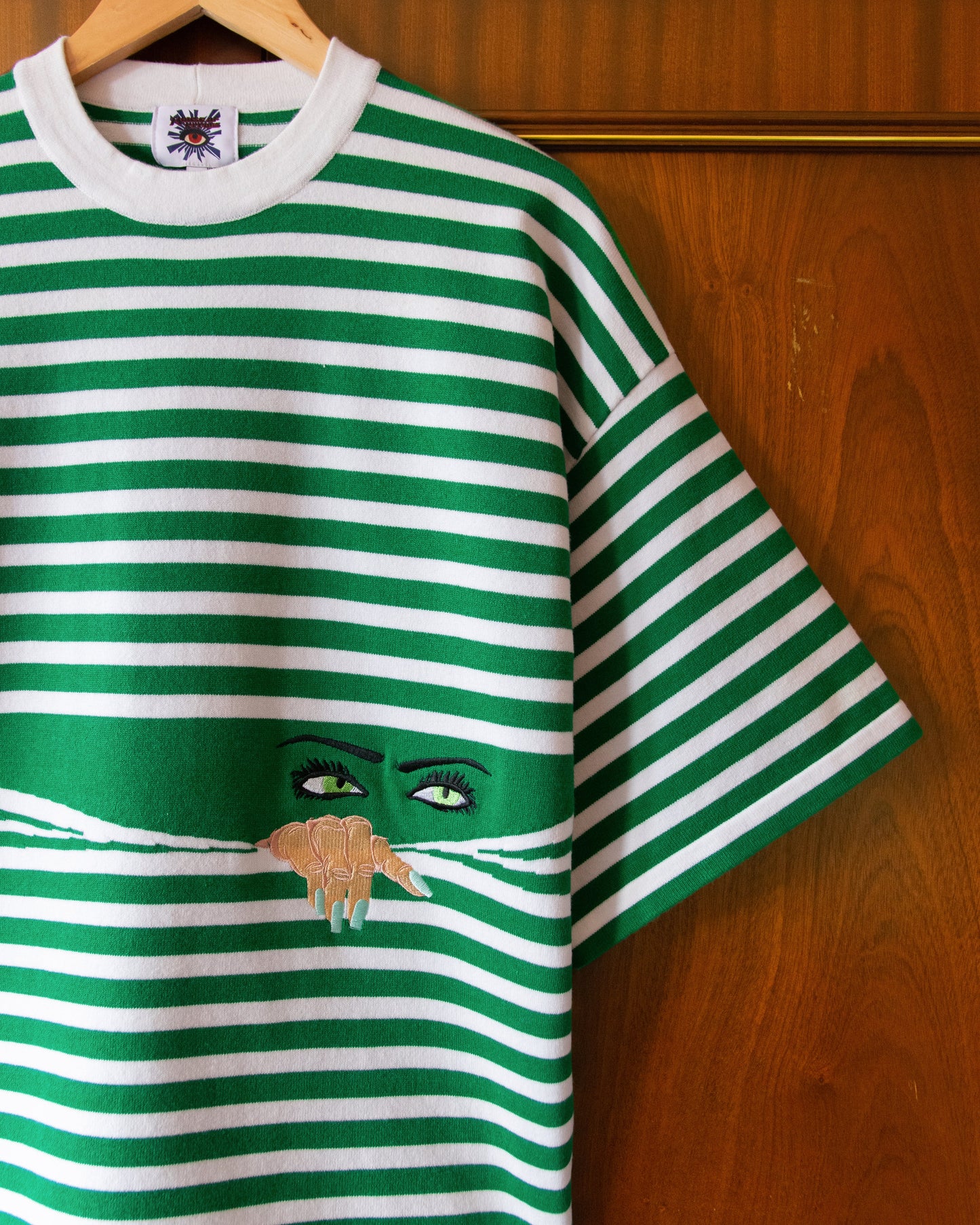 KNITTED PEEPING TEE IN GREEN