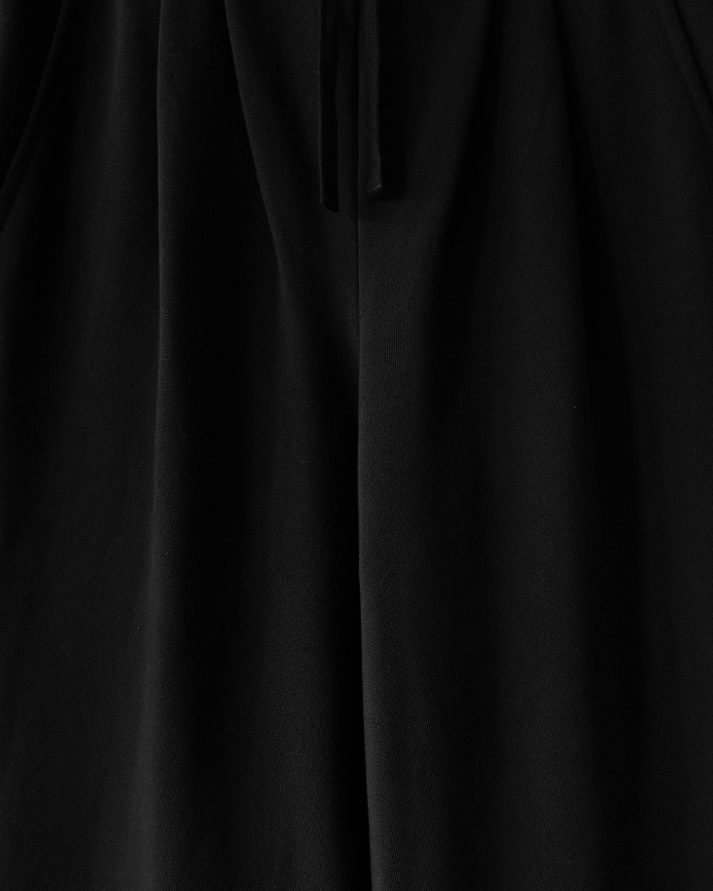 PLEATED JOGGERS IN BLACK