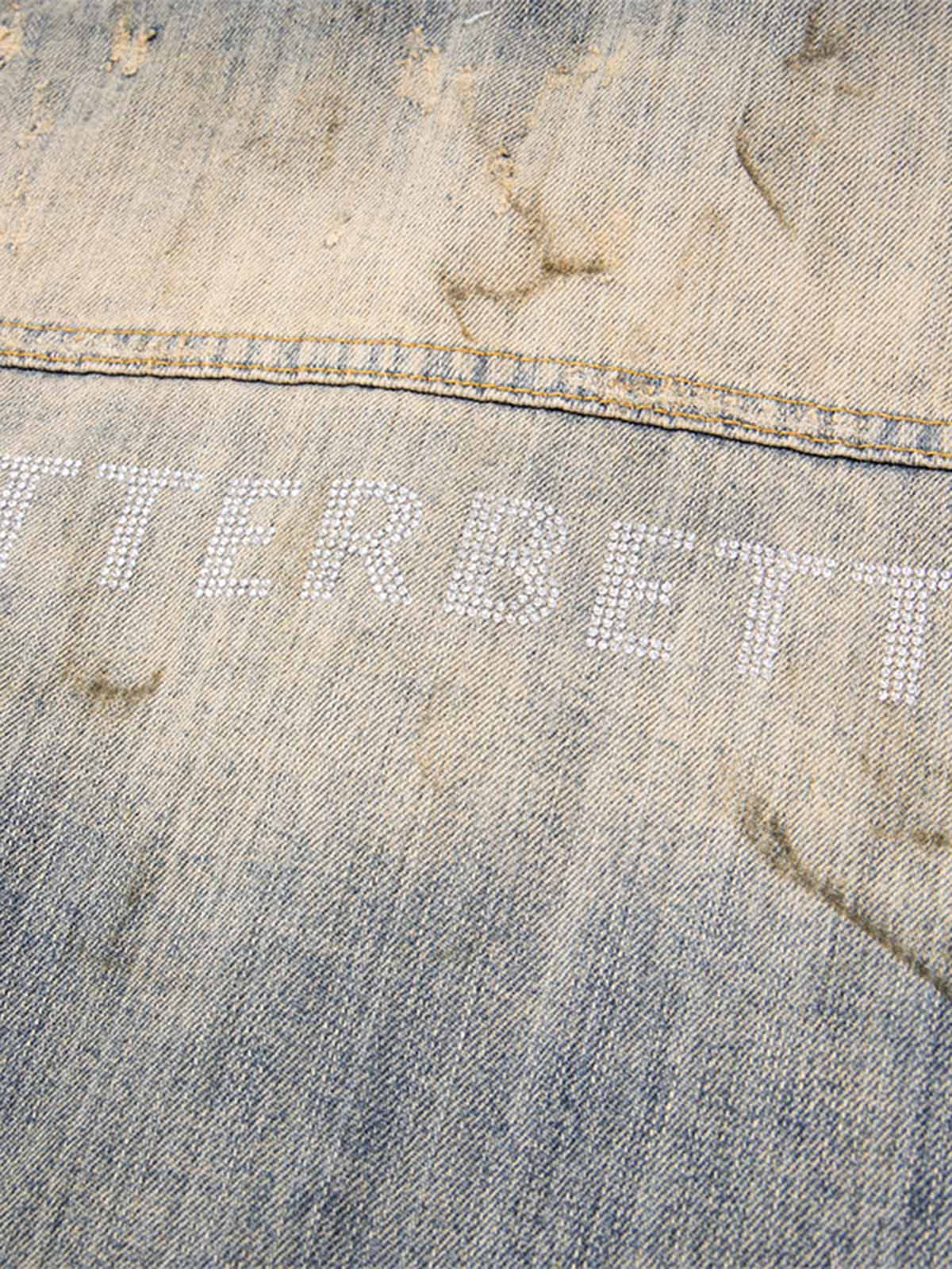 JAQUETA DISTRESSED RHINESTONE MUD-DYED